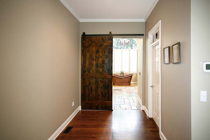 Interesting use of barn door style doors in interior remodeling.